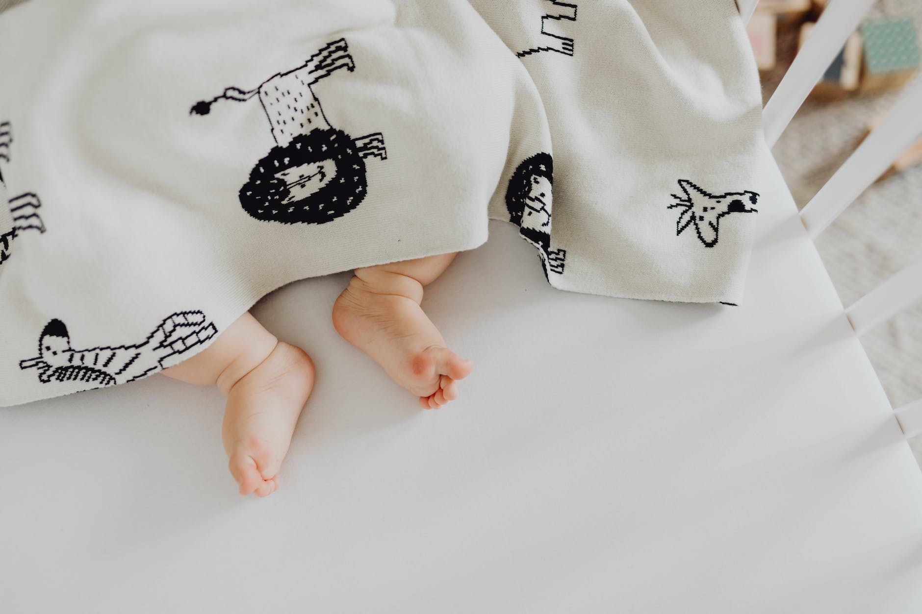 close up photo of a baby s feet